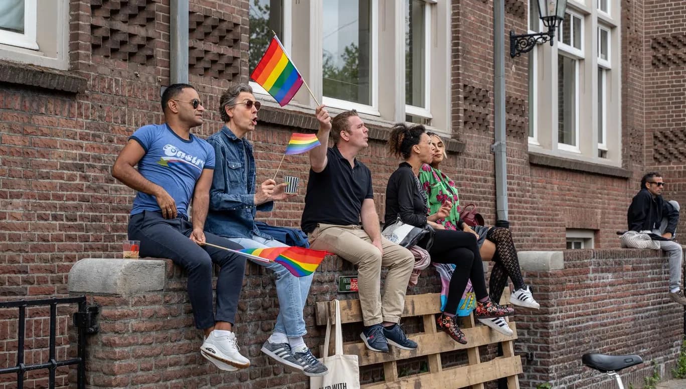 Spectators watching the Queer Walk 2023.
