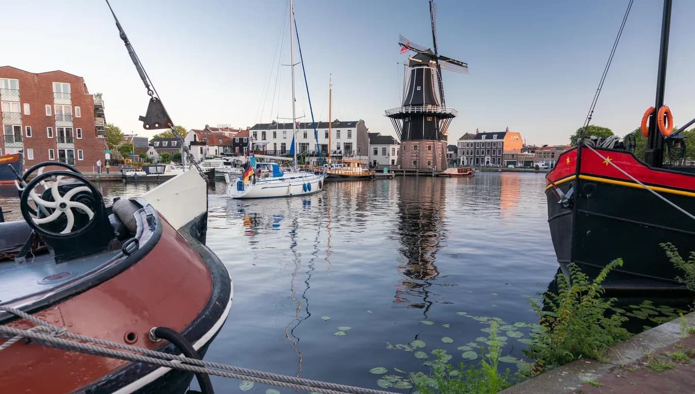Docked boats at the Molen de Adriaan Haarlem Lake