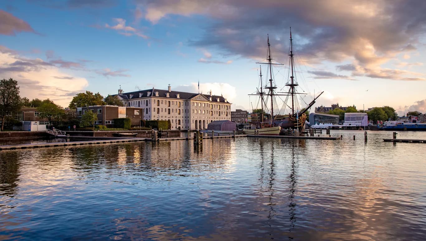 A canal view of  Het Scheepvaartmuseum National Maritime Museum and VOC ship