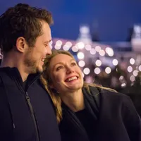 A couple hugging and smiling