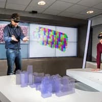 Two men with virtual reality glasses