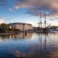 A canal view of  Het Scheepvaartmuseum National Maritime Museum and VOC ship