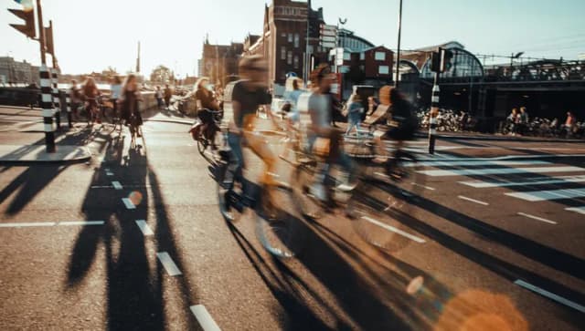 Crowded city street cyclists and pedestrians
1361690416
commuters cycling in Amsterdam