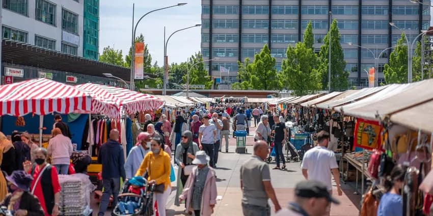 People shopping at market