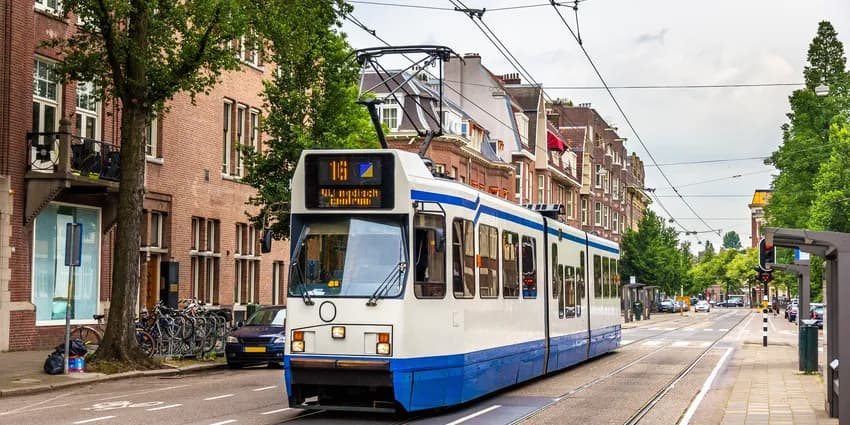 A tram driving in Amsterdam - the Netherlands