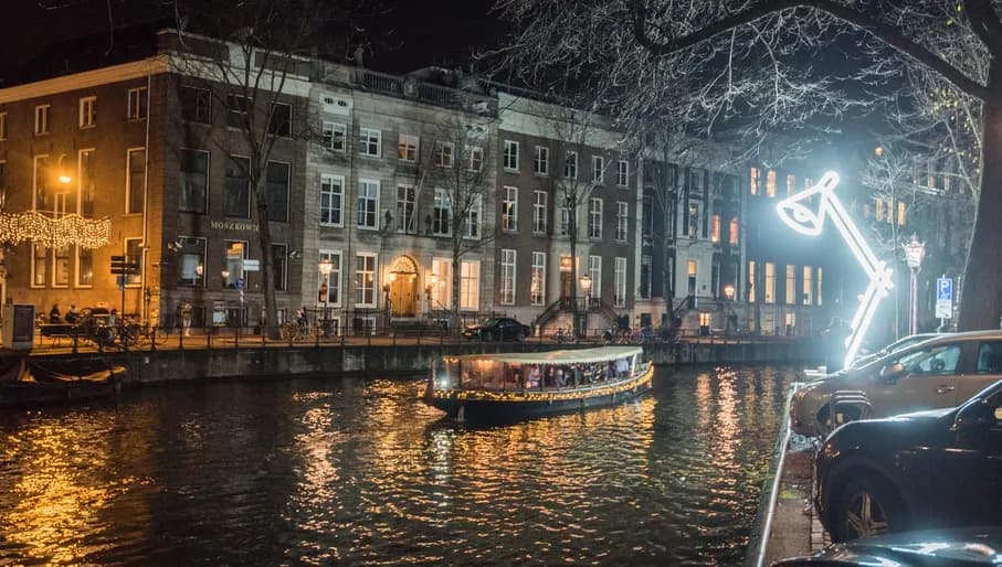 Boat tour at the canal passing the - Two Lamps