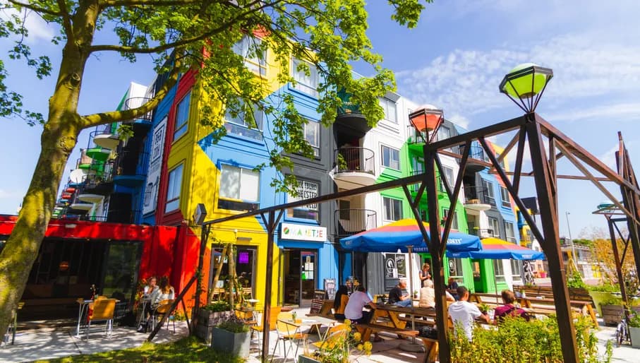 People sitting on terrace outside Oma Ietje Hesterveld