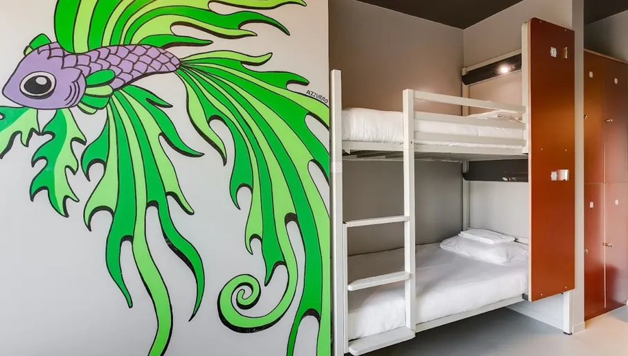 Bunk beds in dorm and interiors of Clink Noord hostel