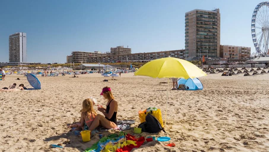 Mother and daughter bathing at Zandvoort beach.