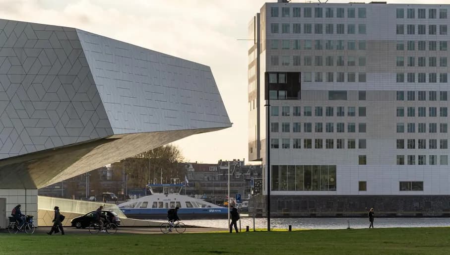 A ferry on Het IJ. On the left EYE Filmmuseum.