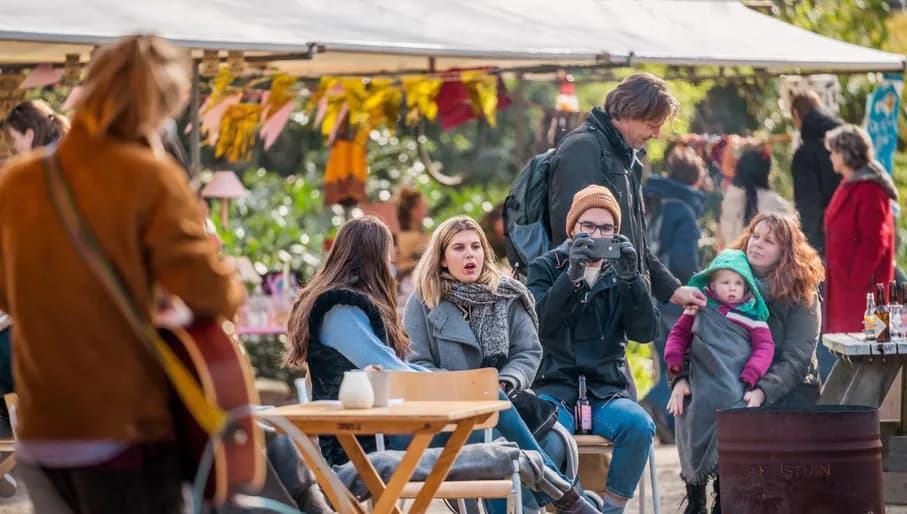 People enjoying a live music performance at the Tolhuistuin