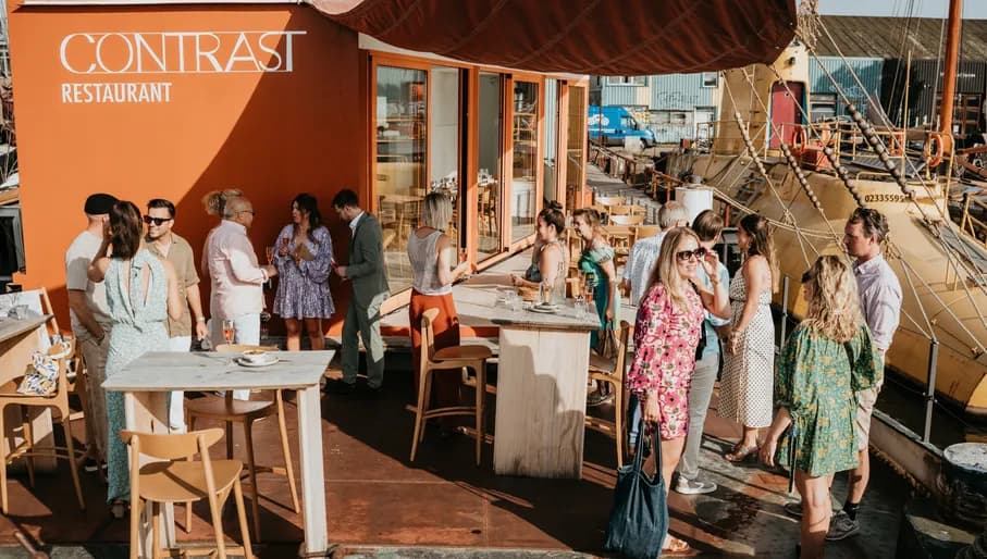 Contrast restaurant people on the terrace