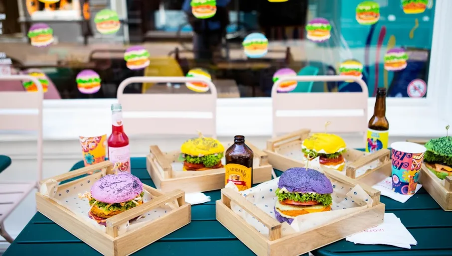 Burgers and drinks on a terrace