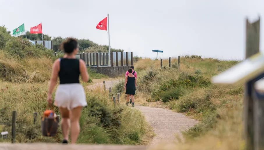People walking through IJmuiderslag