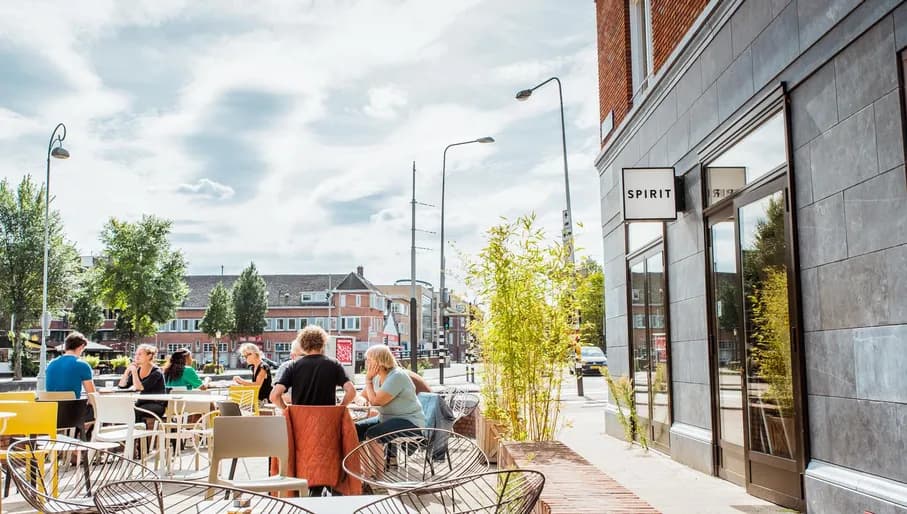 People sitting outside the Spirit patio