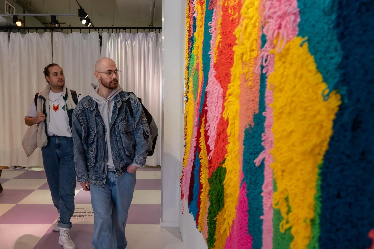 A couple visits OSCAM - Open Space Contemporary Art Museum.