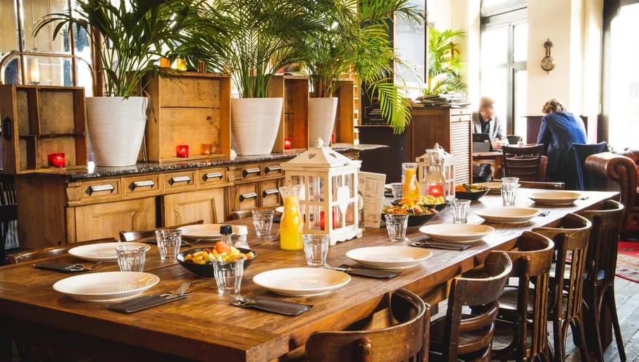 Café Czaar interior, plates set on a dinner table