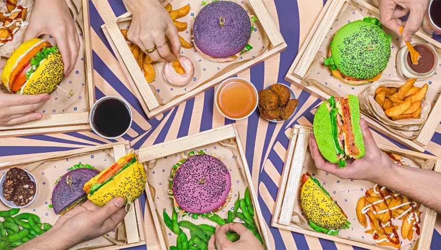 A picture of burgers and fries from above