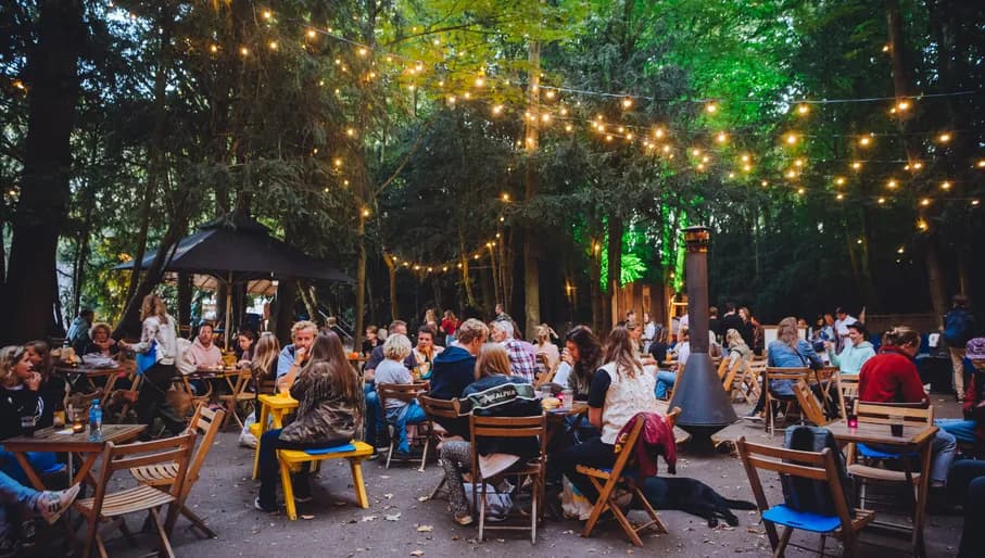 Amsterdamse Bos Theater people sitting on a terrace organised by Cinetree