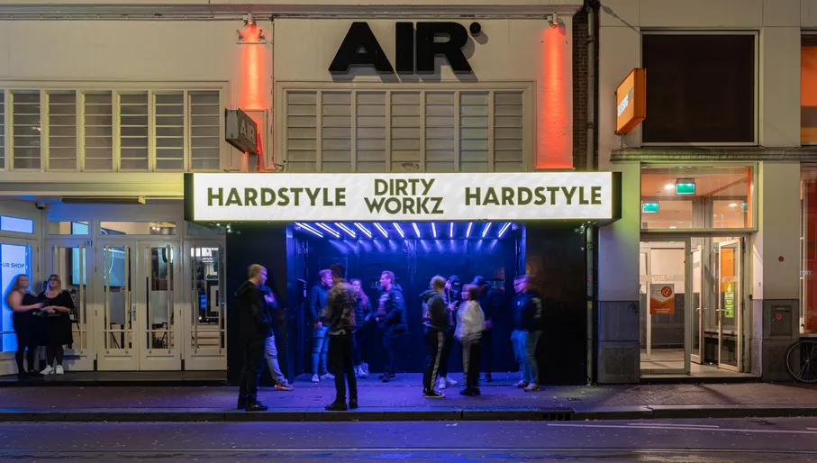 People standing outside at the entrance of Club AIR during Amsterdam Dance Event (ADE) 2022.